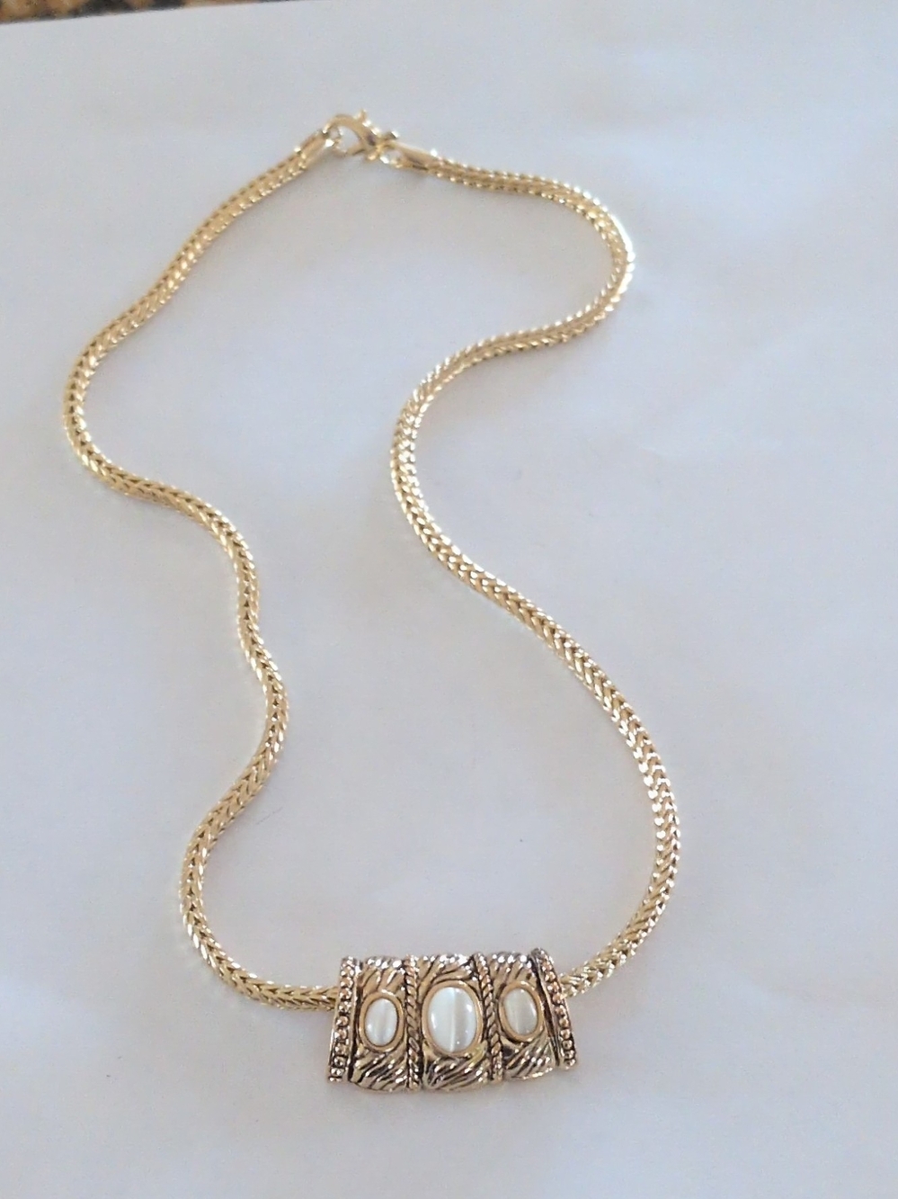 Gold-Tone Pendant Necklace with White Cabochon Accents